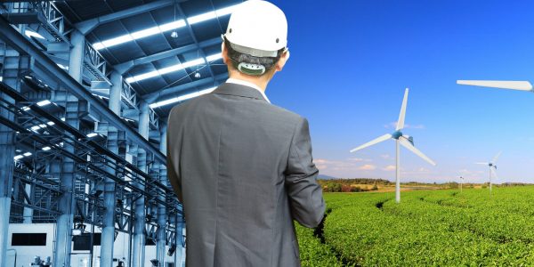 Industry of construction site and engineer working compare Wind turbine, agricultural landscape