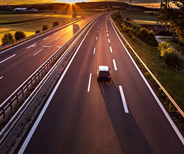 stretch of motorway in Germany by setting sun